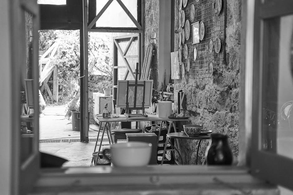 A detailed view of an artist's workshop with easels and paintings in Paphos, Cyprus.